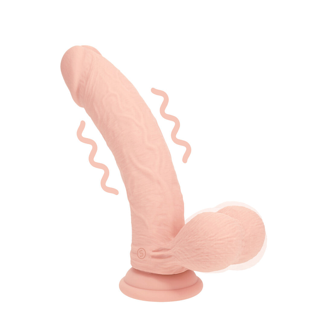 RealRock Dual Density Rechargeable Liquid Silicone Vibrator Curved With Weighted Balls 7 / 18 Cm Flesh